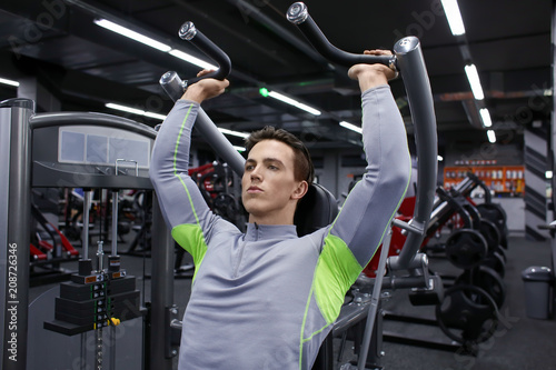 Young man training in moder...