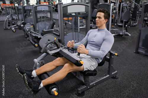 Young man training in moder...