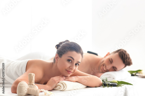 Принти на полотні Happy young couple relaxing in spa salon