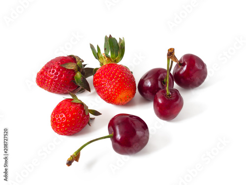Fototapeta Naklejka Na Ścianę i Meble -  Strawberries and cherries on white background