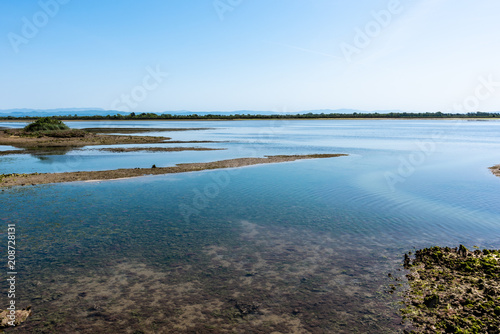 Sanctuary in the lagoon. Between religion and nature. Barbana, Grado