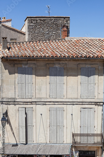 Pastel window shutters in Arles, Provence, France