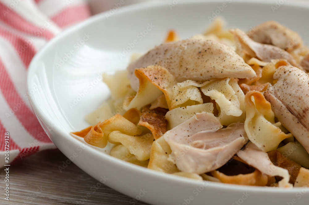 Homemade noodles are cooked with chicken and chicken broth Homemade noodles are cooked with chicken and chicken broth