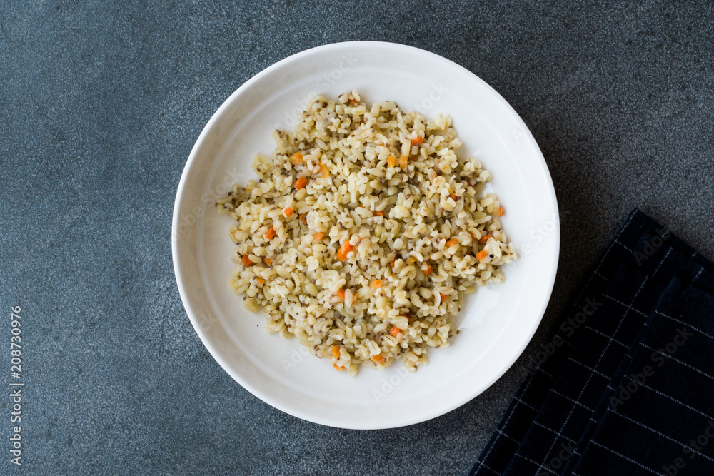Cooked Bulgur Rice with Chia Seeds and Carrot in Plate Ready to Eat / Bulghur for Pilav or Pilaf Cooked Bulgur Rice with Chia Seeds and Carrot in Plate Ready to Eat / Bulghur for Pilav or Pilaf