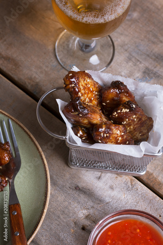 Spicy chicken chicken wings prepared on barbecue. photo