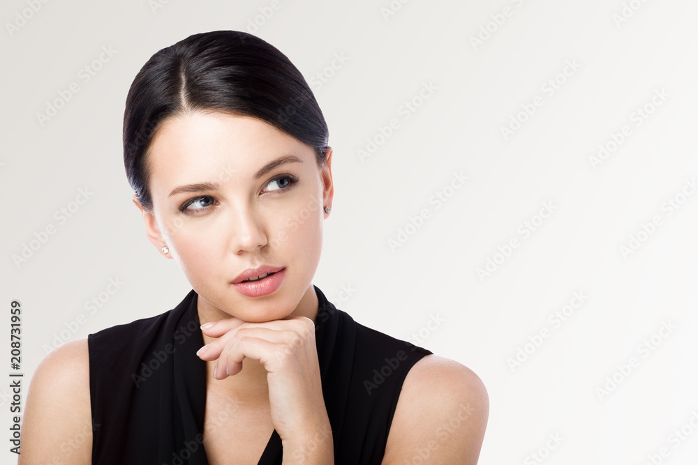 Portrait of a young attractive woman looking away. To think about something or to choose. Portrait of a young attractive woman looking away. To think about something or to choose.
