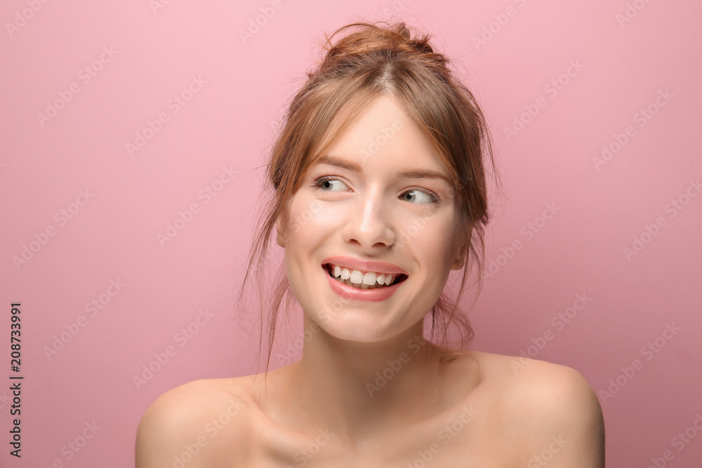 Beautiful young woman with silky skin on color background Beautiful young woman with silky skin on color background