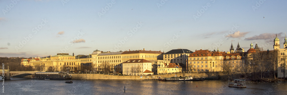 View on the old center of Prague, capital of the Czech Republic with the river Moldau on the foreground
