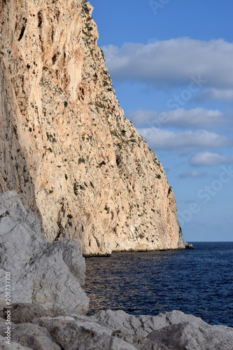 Beautiful view of the Rock of Ifach, the Mediterranean Sea and the blue sky with white clouds