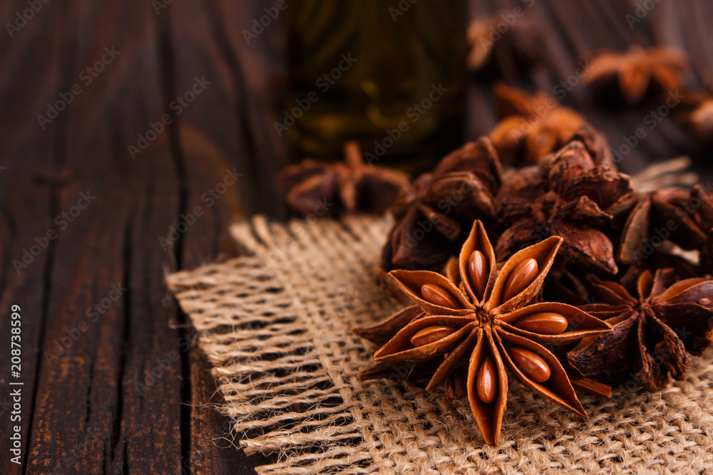 anise stars on a dark rustic background anise stars on a dark rustic background