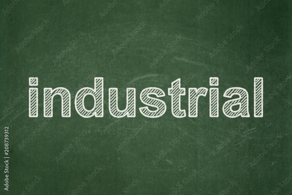 Obraz premium Manufacuring concept: text Industrial on Green chalkboard background
