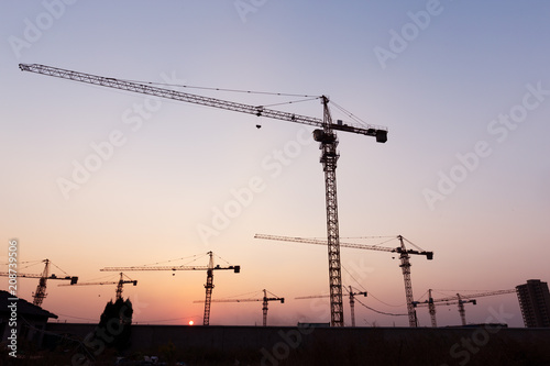 lift with sunset in building site