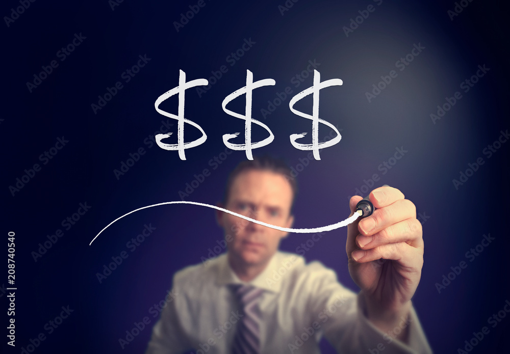 A businessman writing a Dollars concept with a white pen on a clear screen. A businessman writing a Dollars concept with a white pen on a clear screen.