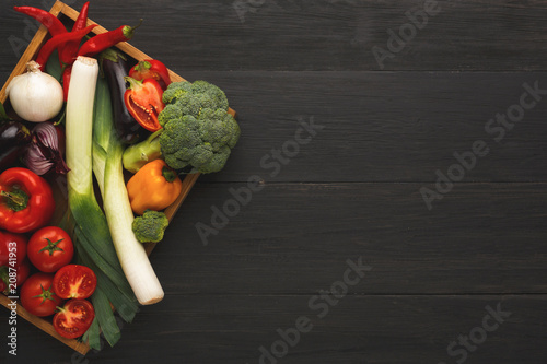 Fresh vegetables on wooden background, copy space