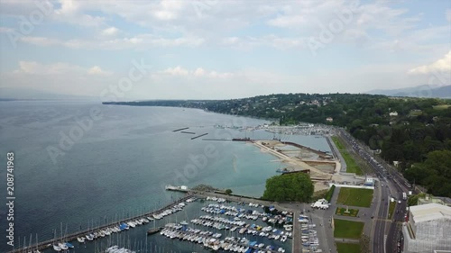 day time geneva lake bay yacht dock aerial panorama 4k switzerland
