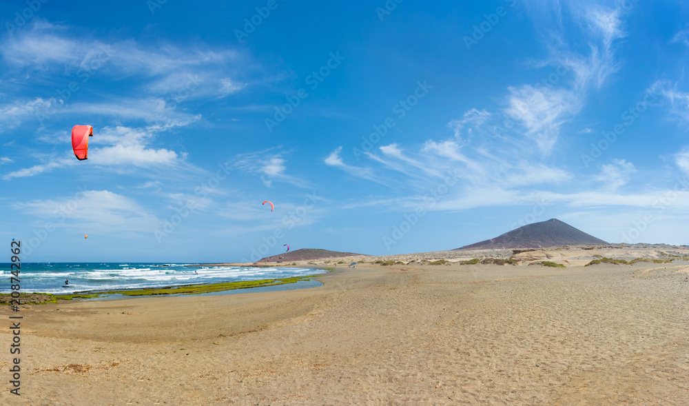Beautiful view of El Medano beach and Red Mountain (Montana Roja) on the background. Tenerife, Canary Islands.
