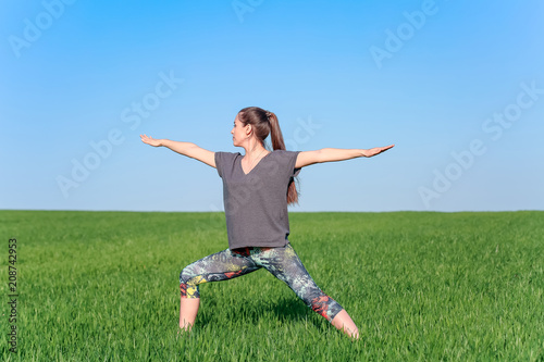 Young girl doing yoga outdoor