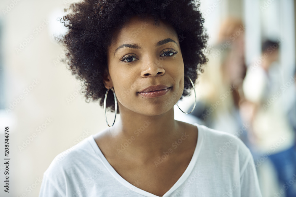 Female college student smiling cheerfully, portrait