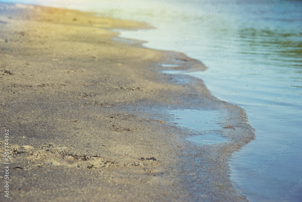 Sandy beach near the river. Summer vacation. Sandy beach near the river. Summer vacation.