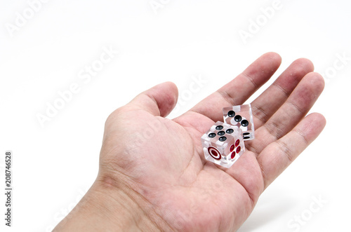 Dice in hand.