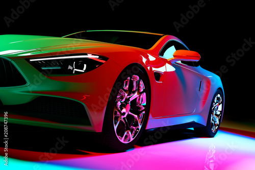 Modern coupe car in colorful spotlights