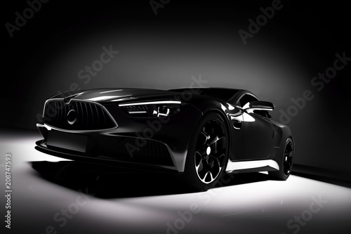 Modern black sports car in a spotlight on a black background.