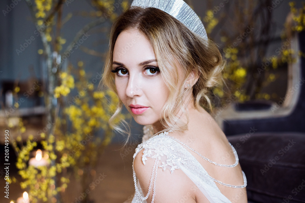Blonde bride in fashion white wedding dress with makeup Blonde bride in fashion white wedding dress with makeup