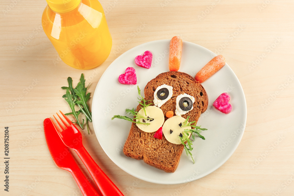 Creative breakfast for children on plate. Recipe ideas with bread Creative breakfast for children on plate. Recipe ideas with bread
