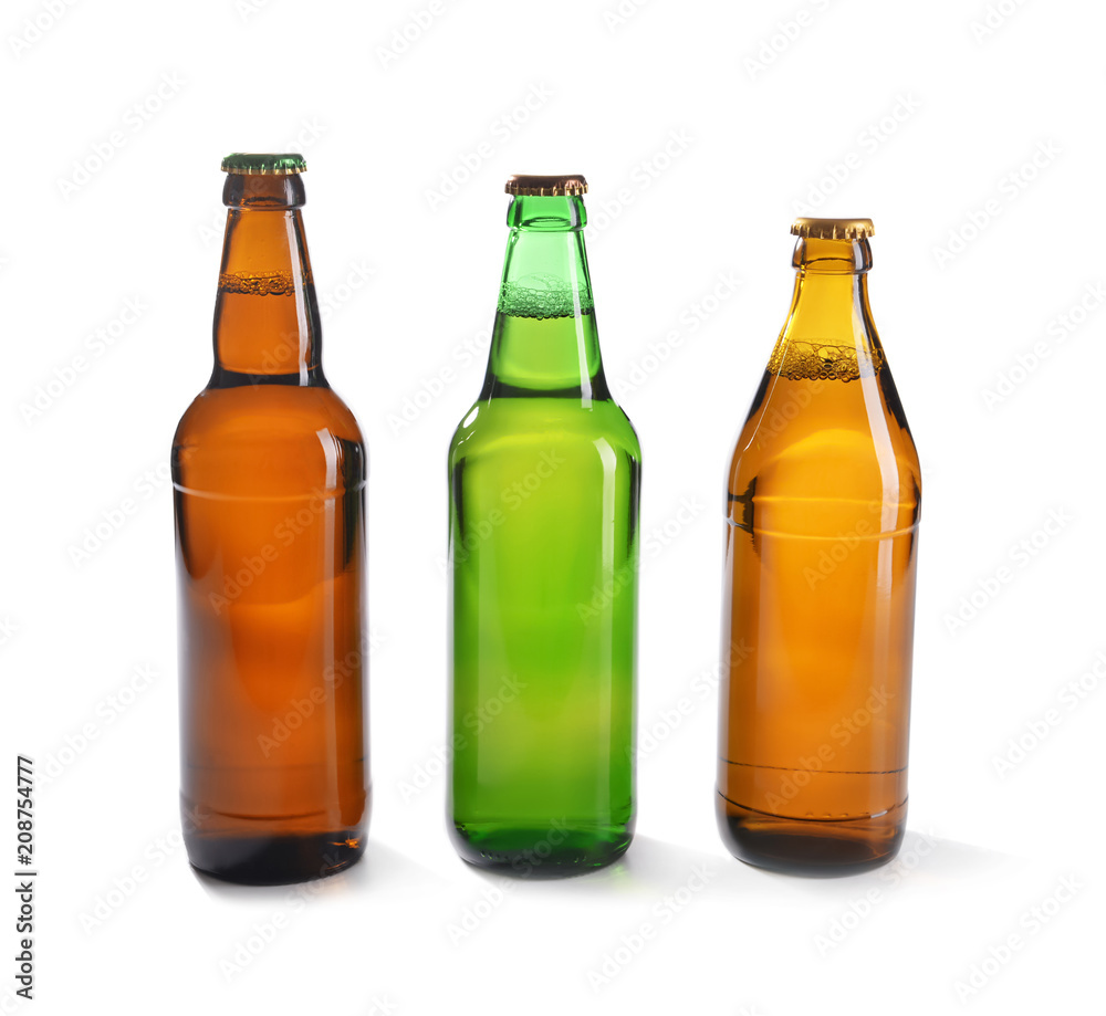 Glass bottles of beer on white background Glass bottles of beer on white background
