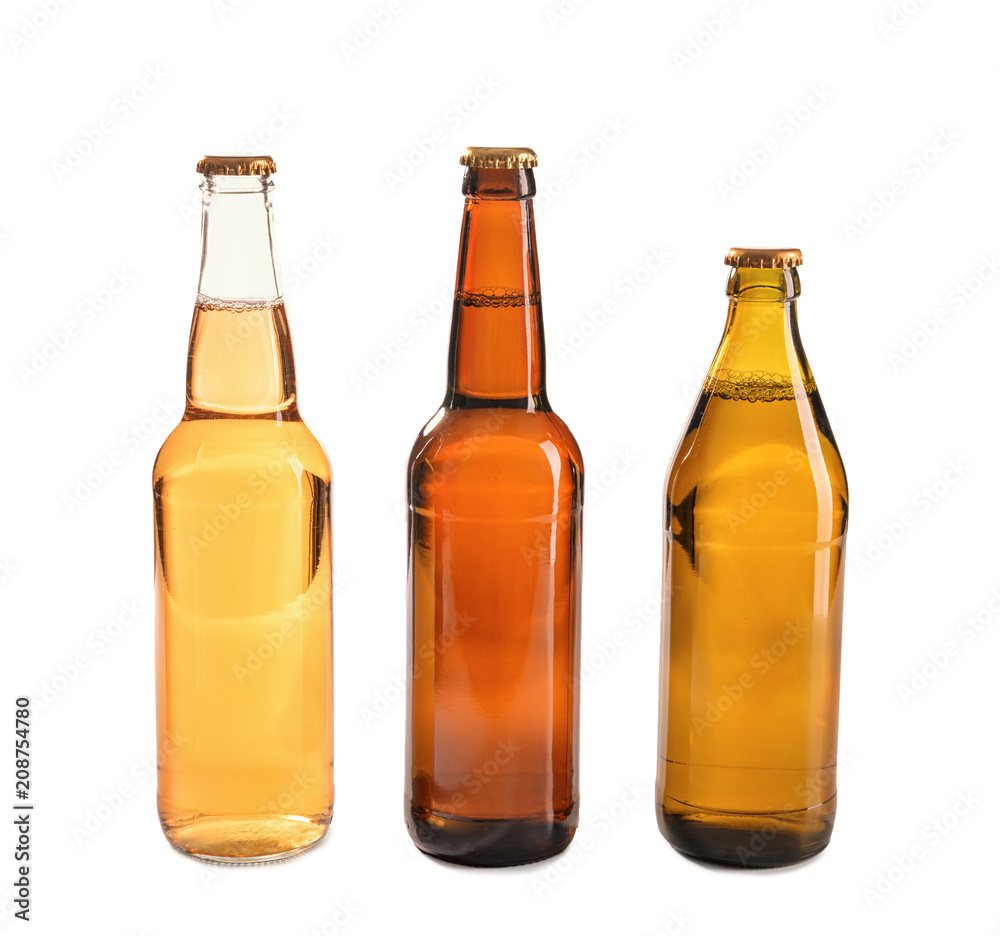Glass bottles of beer on white background Glass bottles of beer on white background
