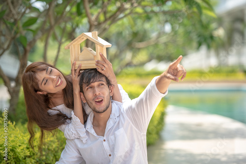 Quadro su tela Young Asian couple spending time together and planing his future life