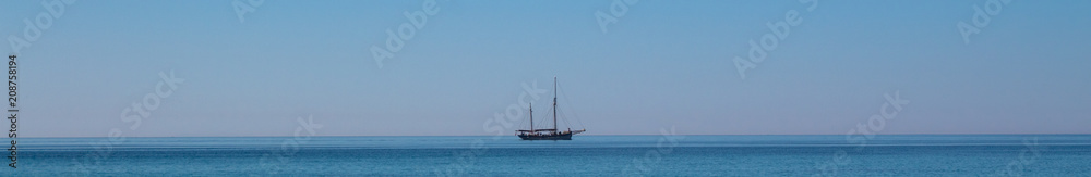 Sailboat on the horizon panorama