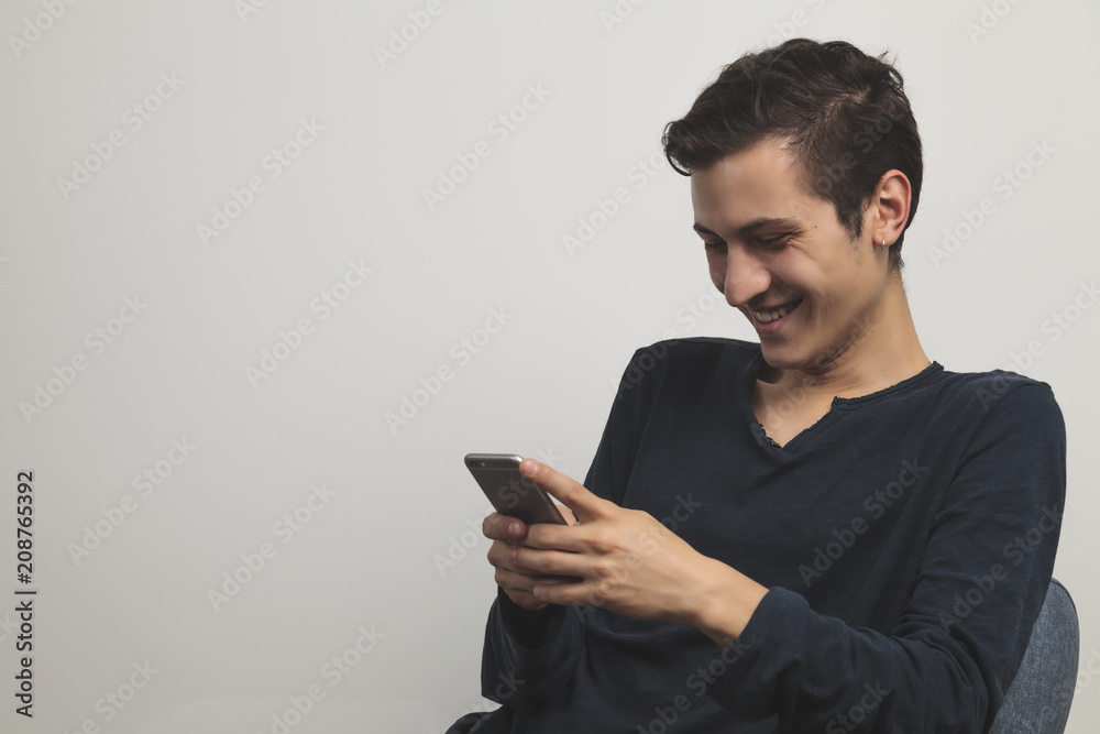 Man using his Mobile Phone, white Background Man using his Mobile Phone, white Background
