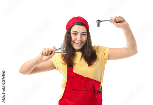 Female mechanic in uniform ...