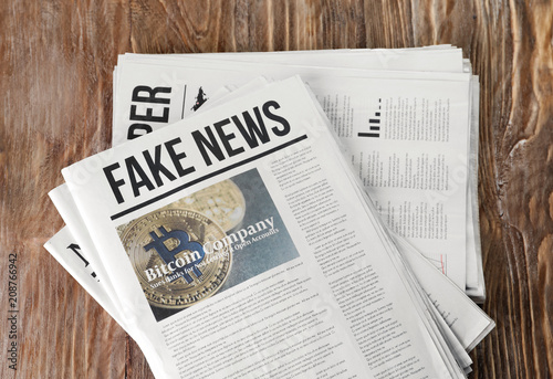 Morning newspapers on wooden table