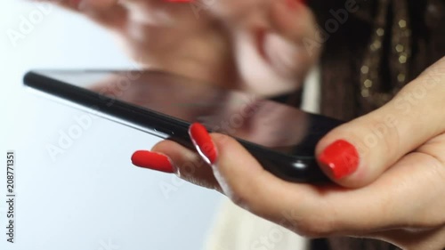 the girl is using a smartphone