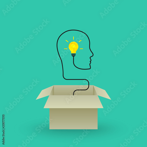 Think outside the box concept with bright lightbulb emerging out of cardboard box. Wire forming face profile outline.