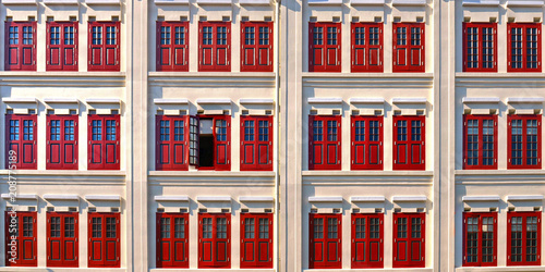 white building and red windows in classic colonial architecture buildings in singapore china town