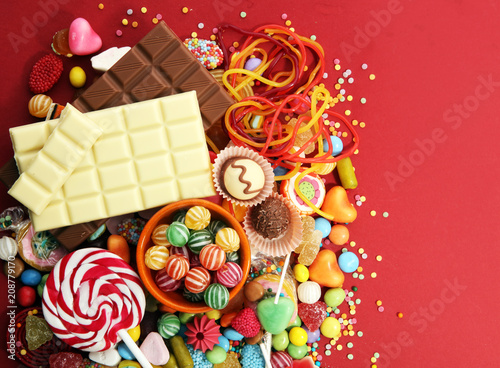 candies with jelly and sugar. colorful array of different childs sweets and treats