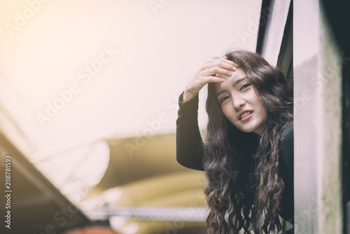 Asian woman traveler has exciting with traveling by train at Hua Lamphong station at Bangkok, Thailand. photo