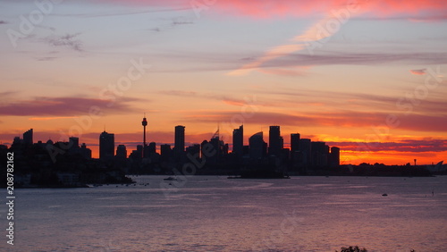 Sydney skyline sunset view from Milk Beach