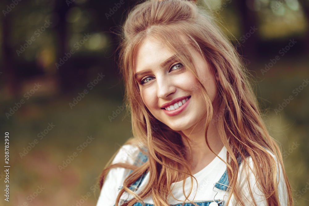 Outdoors portrait of beautiful young girl Outdoors portrait of beautiful young girl