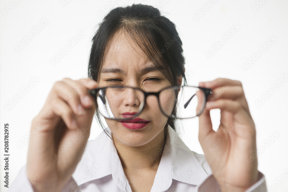 Myopia, close-up portrait of young woman in eyeglasses Myopia, close-up portrait of young woman in eyeglasses