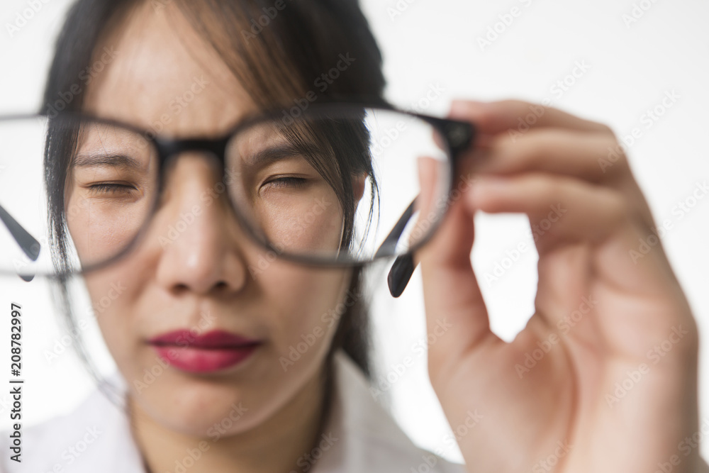 Myopia, close-up portrait of young woman in eyeglasses Myopia, close-up portrait of young woman in eyeglasses