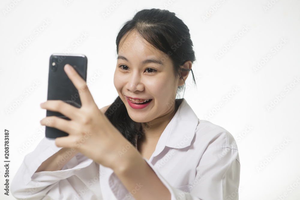 Portrait of young woman taking a selfie, smiling and happy woman Portrait of young woman taking a selfie, smiling and happy woman