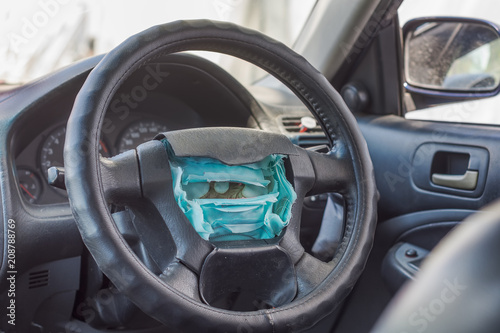 Принти на полотні Torn airbag on the steering column of the car, Safety concept