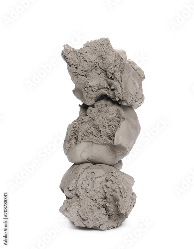 Grey modelling clay lump shape isolated on white background