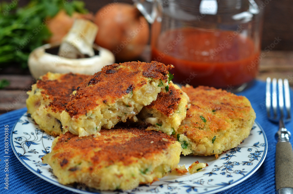 Vegetarian cutlets on a plate on a wooden background Vegetarian cutlets on a plate on a wooden background