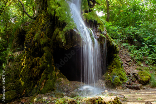 Grotto  an artificial waterfall. Malievtsy  Khmelnitsky region  Ukraine.