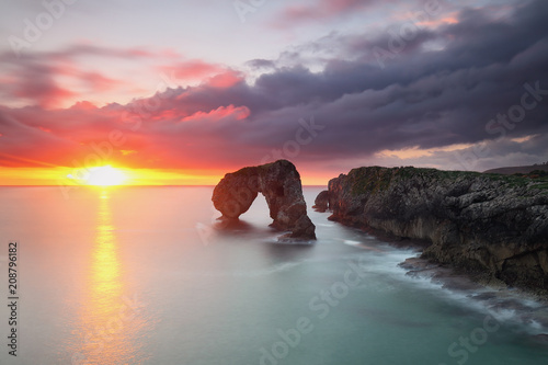 Amazing sunrise at Asturias Coastline (Spain) photo